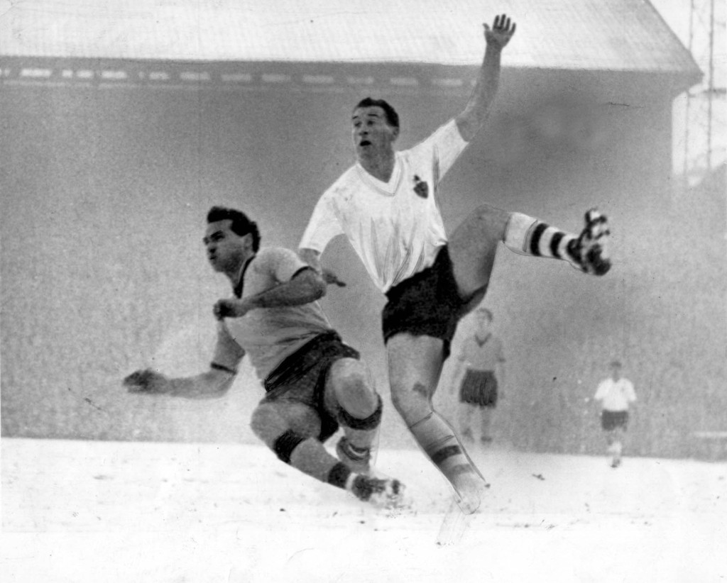 A skirmish in the Molineux snow with Bolton's Nat Lofthouse. 