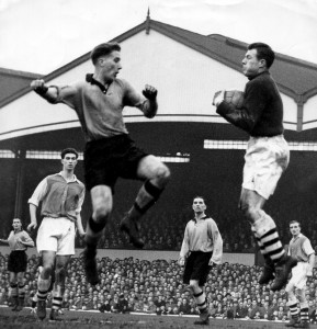 Challenging Arsenal keeper Jack Kelsey in a game at Molineux in January, 1955. 
